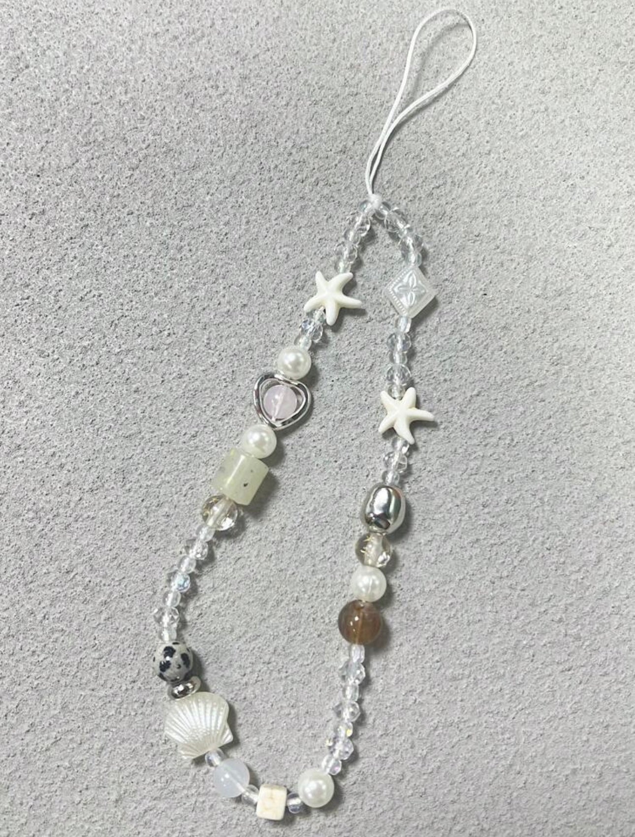 Niah phone charm
