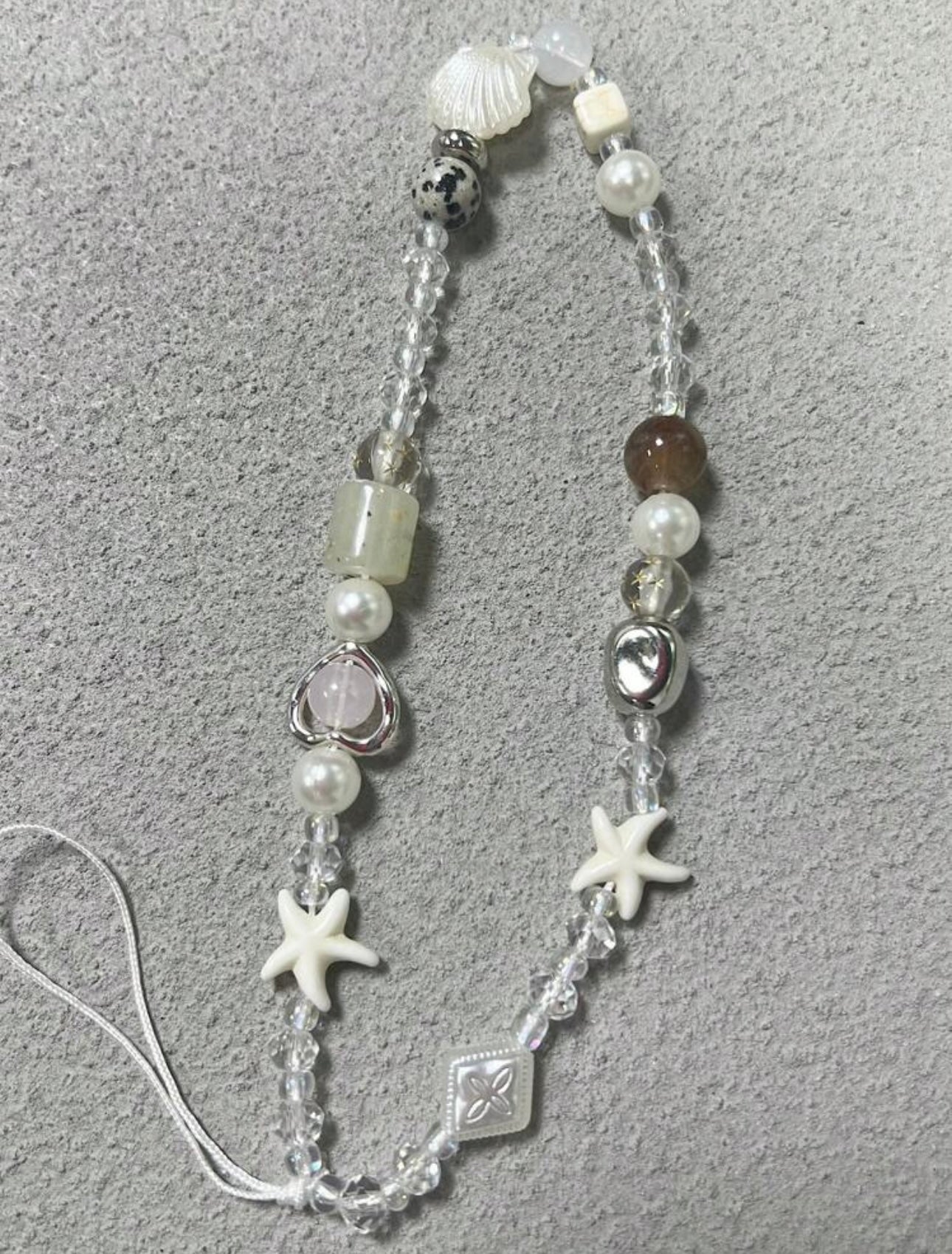 Niah phone charm