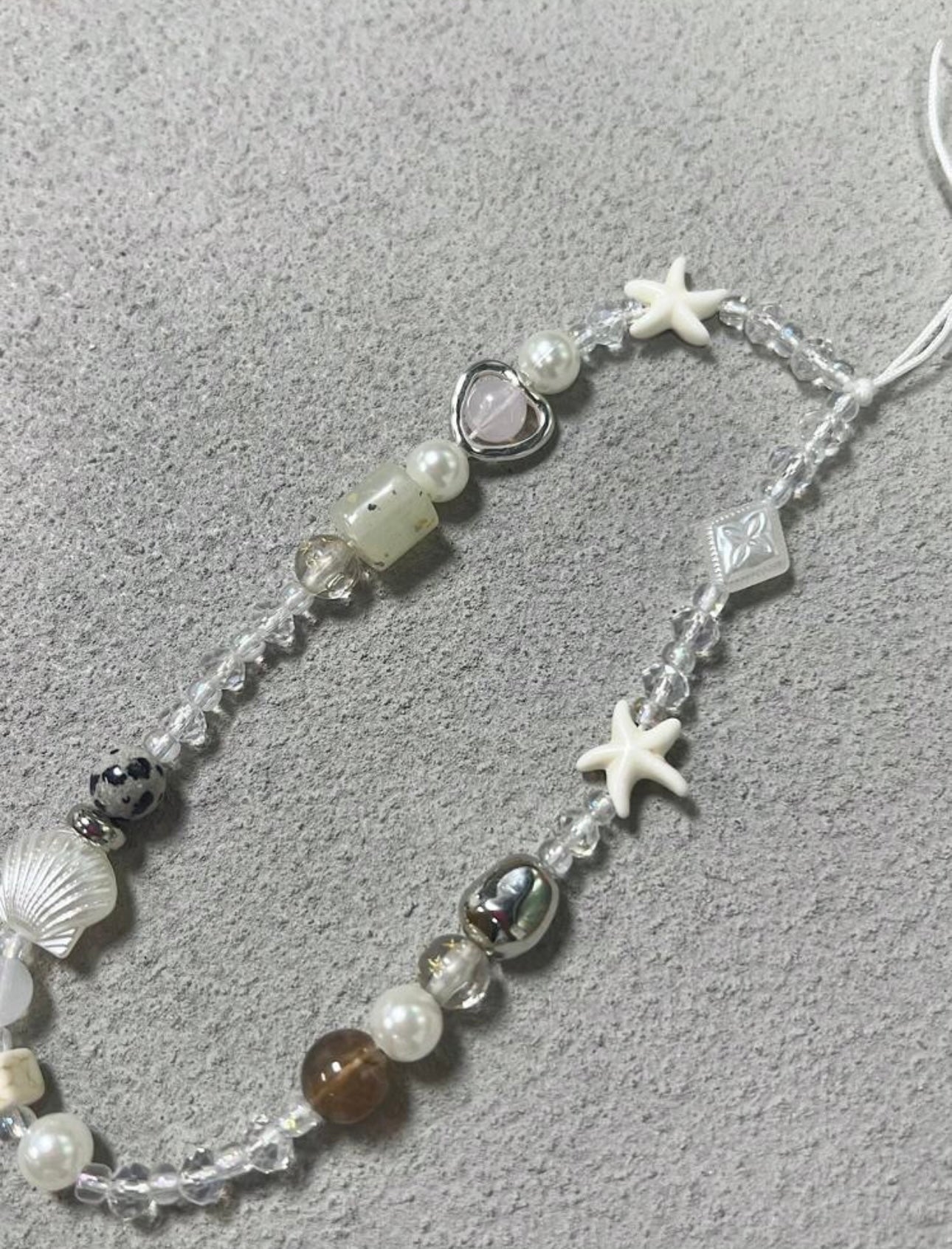 Niah phone charm