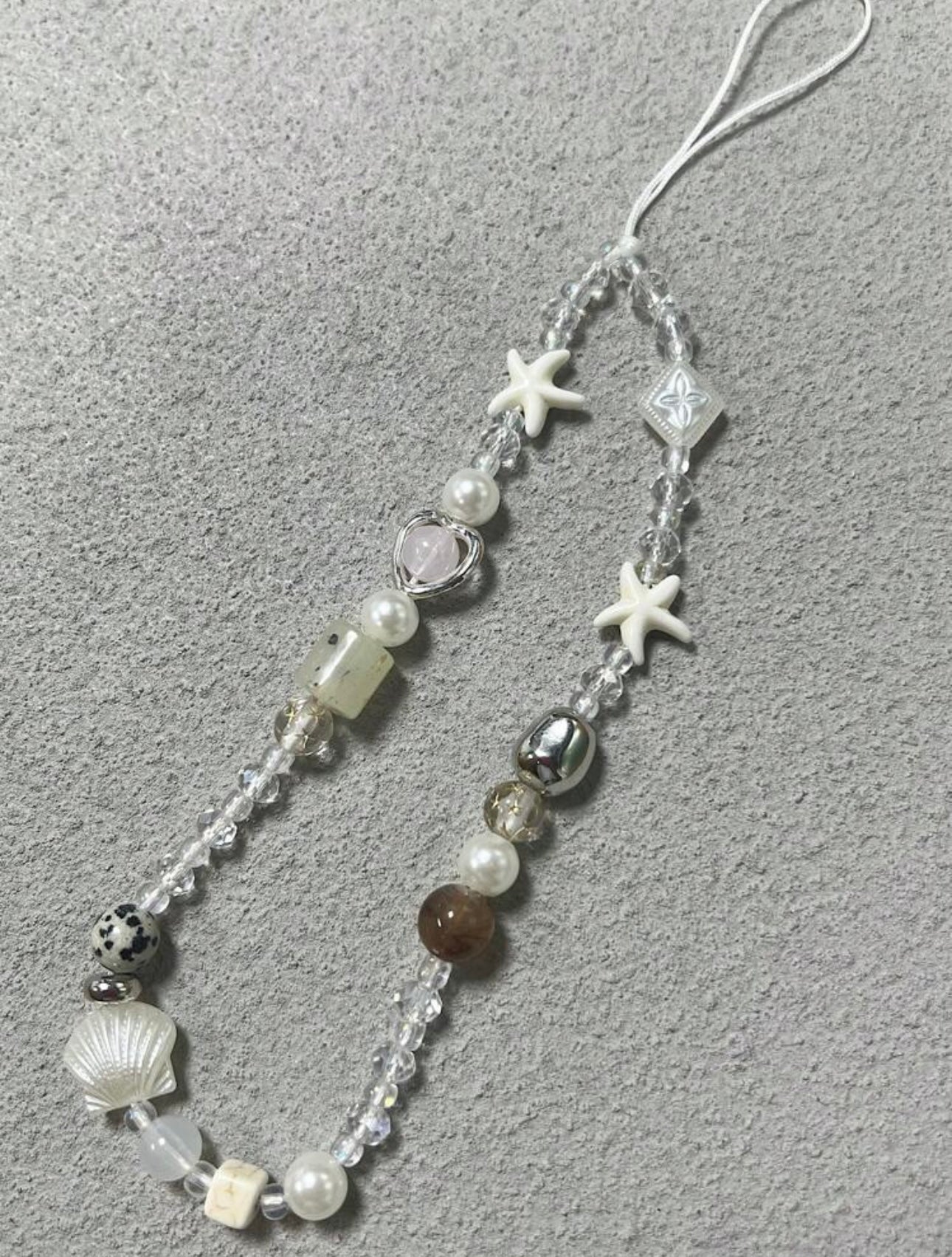 Niah phone charm