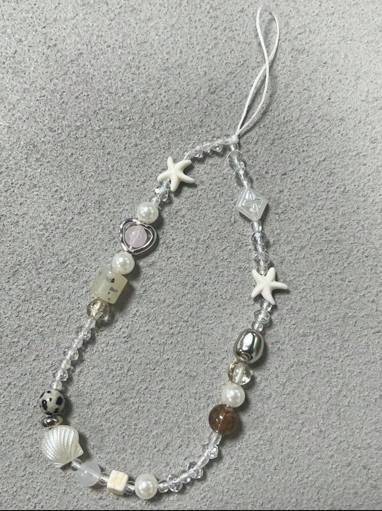 Niah phone charm